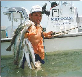 Captain Tony with a full stringer of fish.